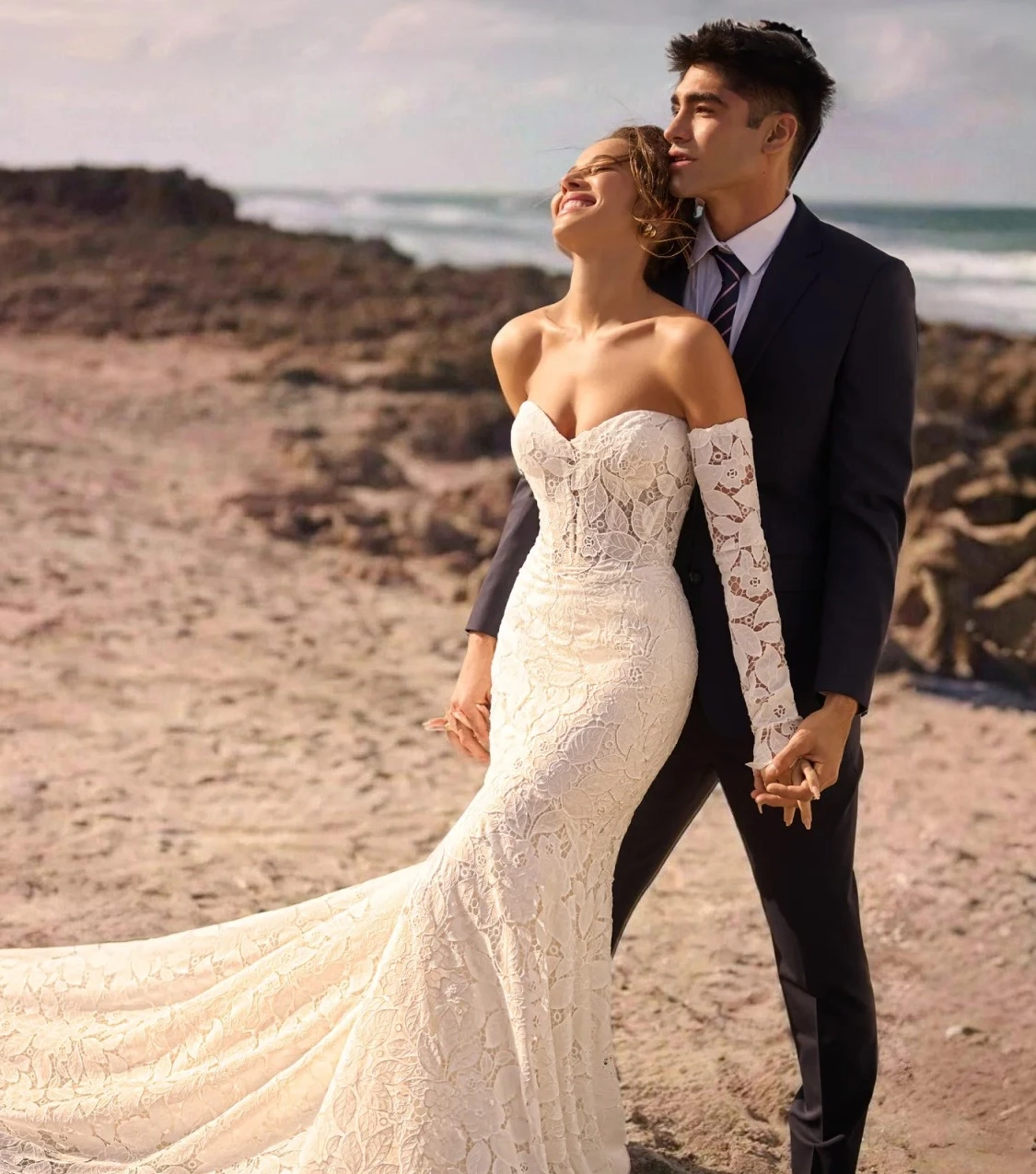 Model wearing a white gown